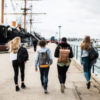 Welcome to the Journey! Starting as a First Year History student Students next to HMS Warrior