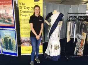 Emily standing in front of the D-Day 75 exhibition