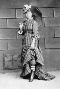 A fashionably-dressed German prostitute, 1880.