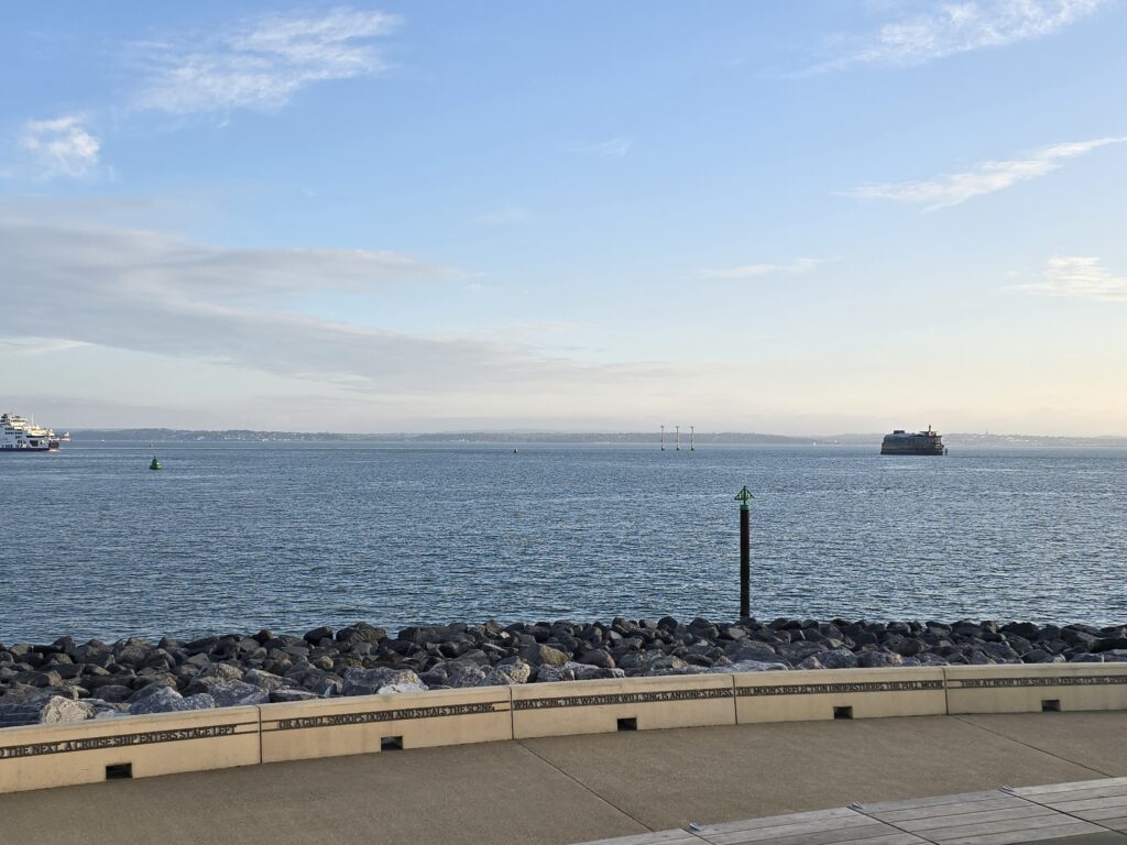 Figure 1: View from Southsea seafront across the Solent towards the Isle of Wight, with Spitbank Fort visible, demonstrating the strategic visibility of the coastline